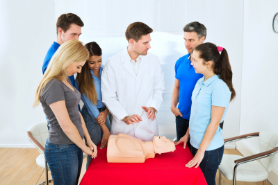 health class instructor demonstrating CPR